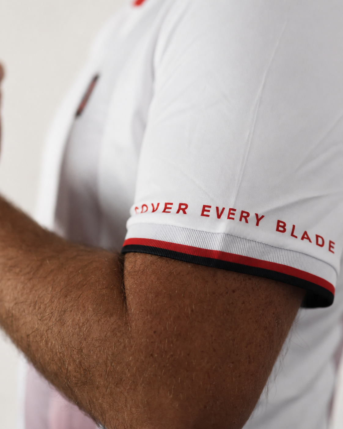 Cover Every Blade sleeve detail on the Ghost White training kit