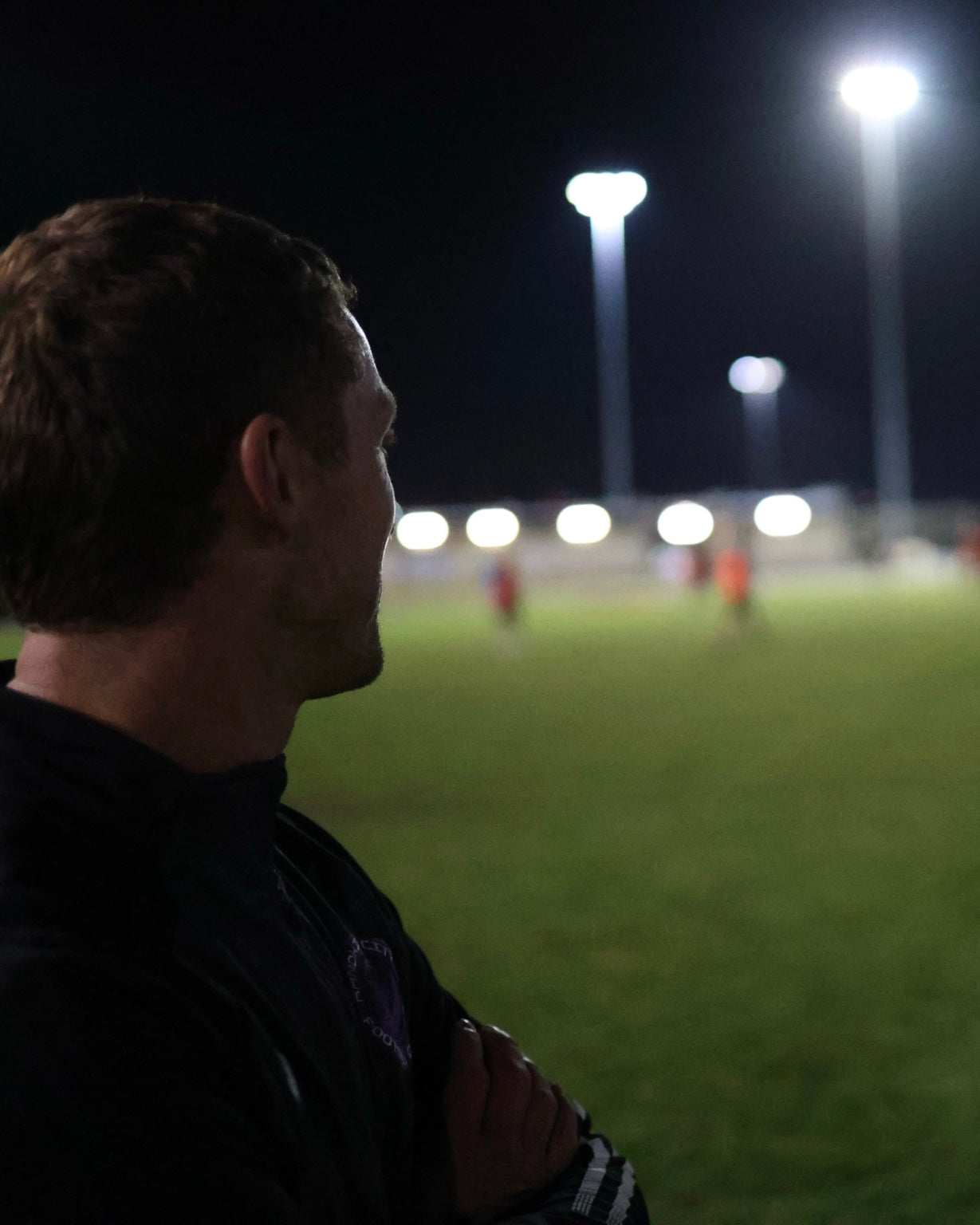 Calum Mclellend watching Randwick City AA1 training over his shoulder